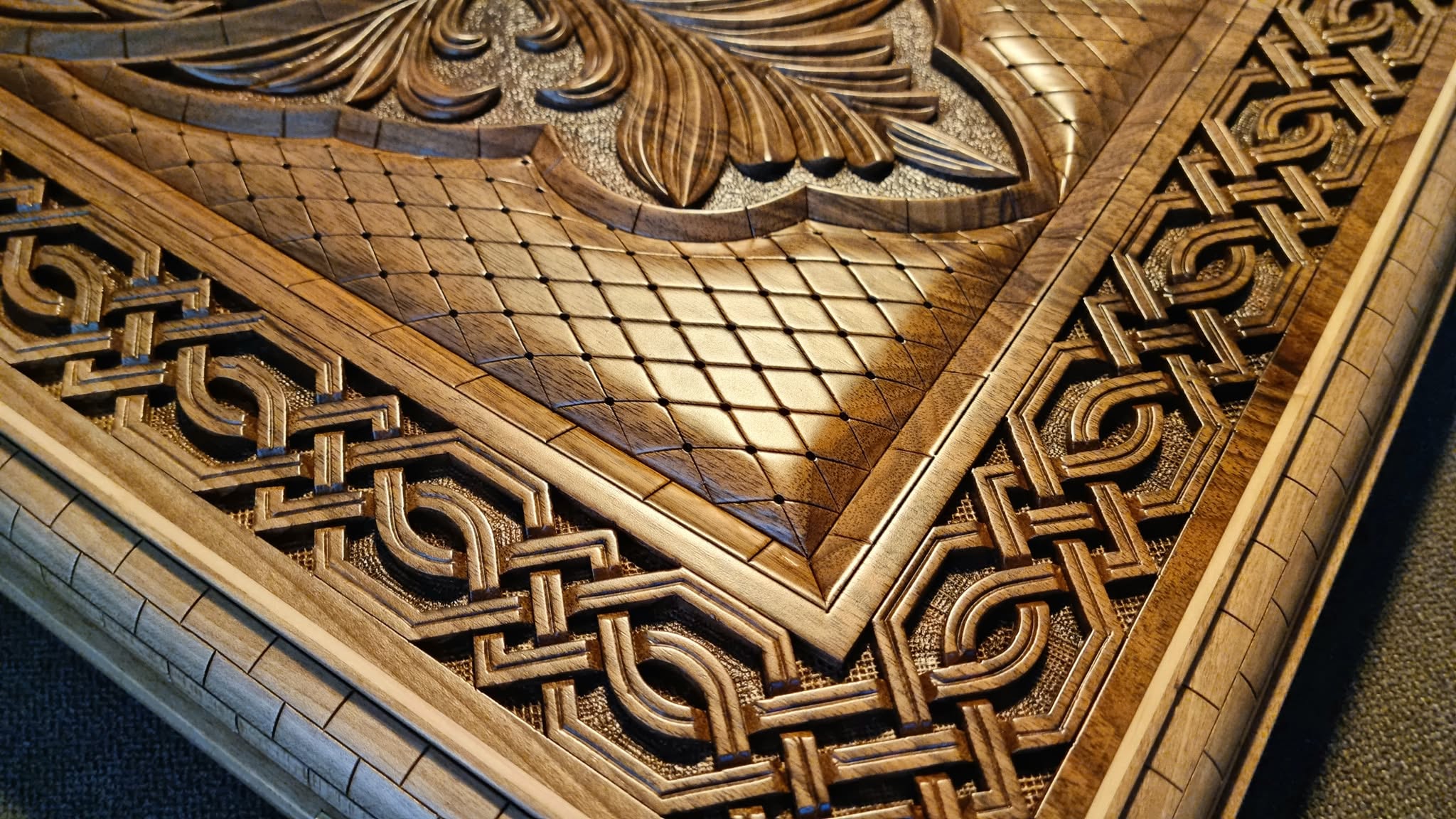 Corner detail — lattice ground and knotwork border