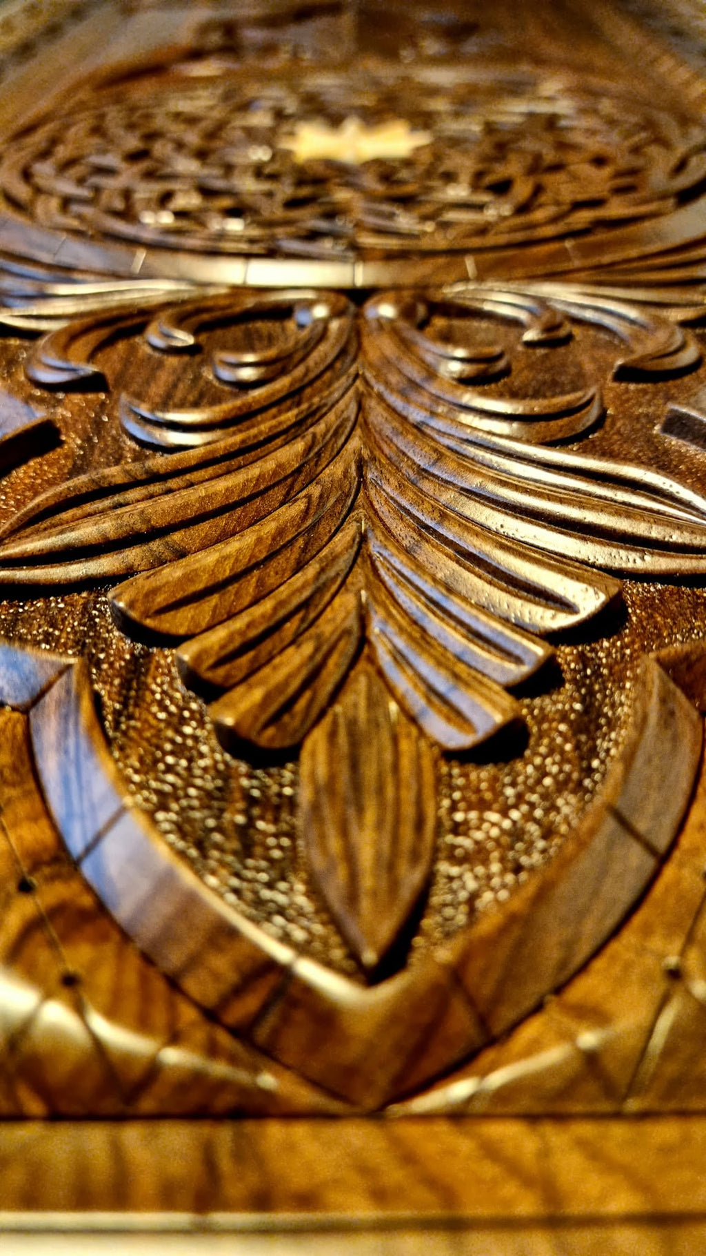 Acanthus leaf carving detail with textured ground