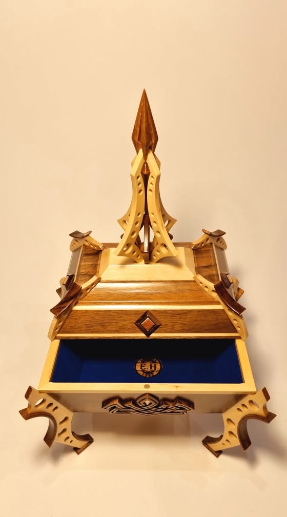 Open vessel from the front — velvet-lined interior