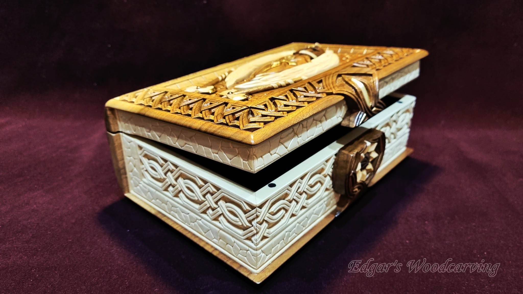 Half-open — hinge and carved lattice lid
