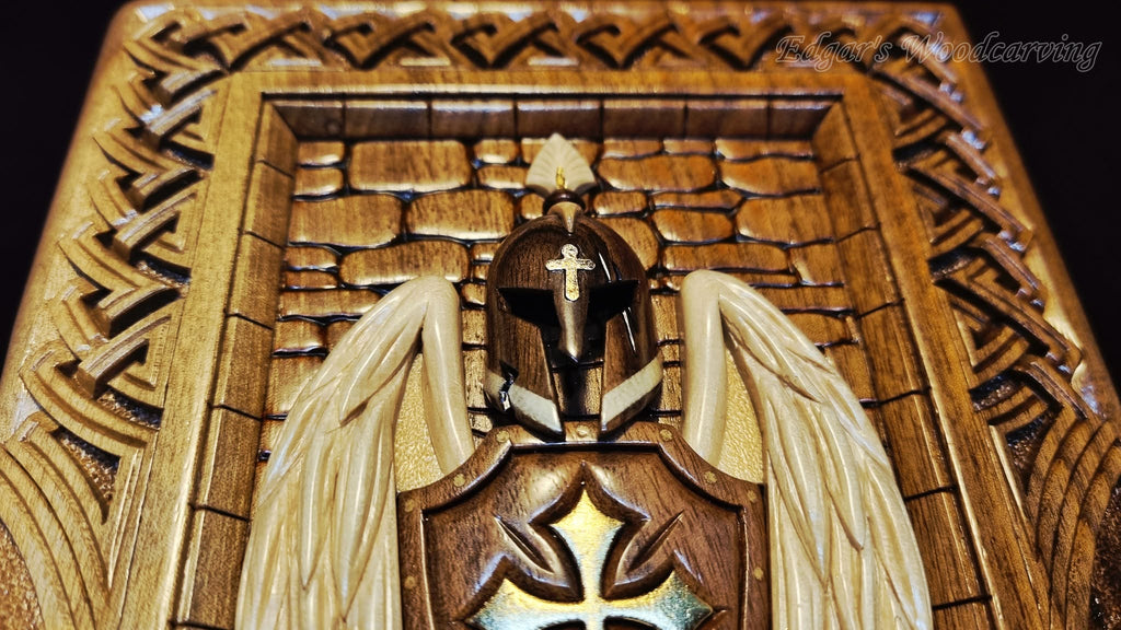 Helmet and wings — carving detail
