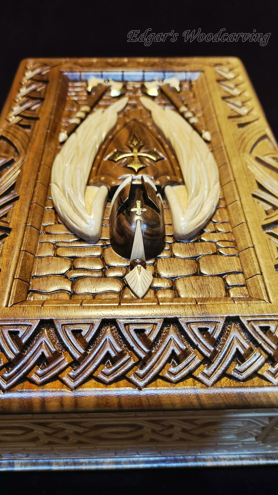 Helmet front — cross shield macro detail