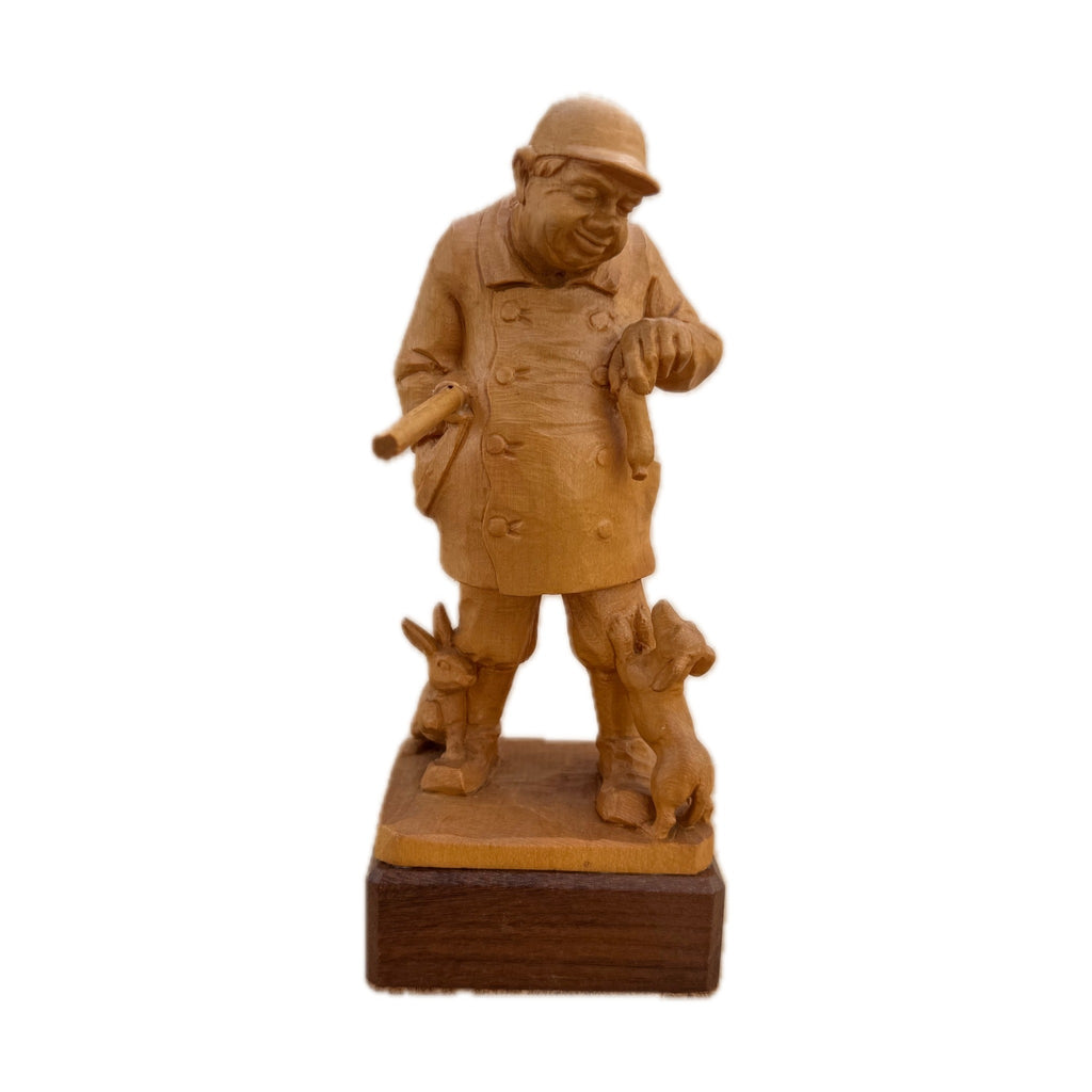 Sausage Anyone — hand-carved maple sculpture by Georges Boujakly