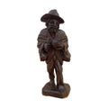Help Please — hand-carved maple figurine by Georges Boujakly