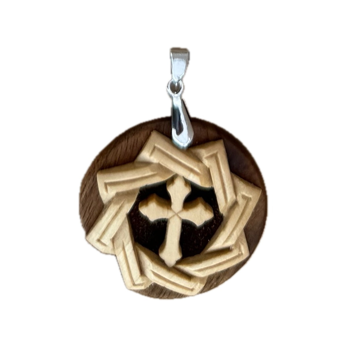 Laced Pendant — cross in carved wreath