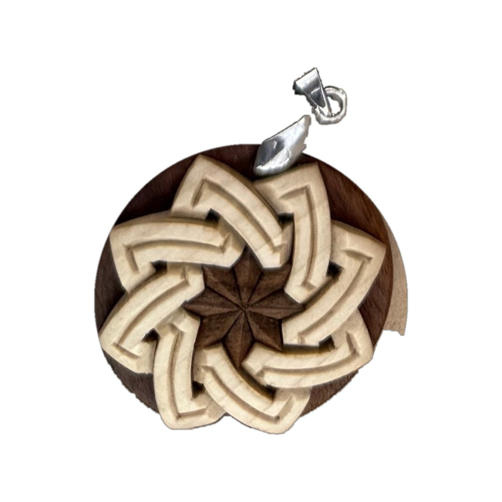 Laced Pendant — star knot with carved center