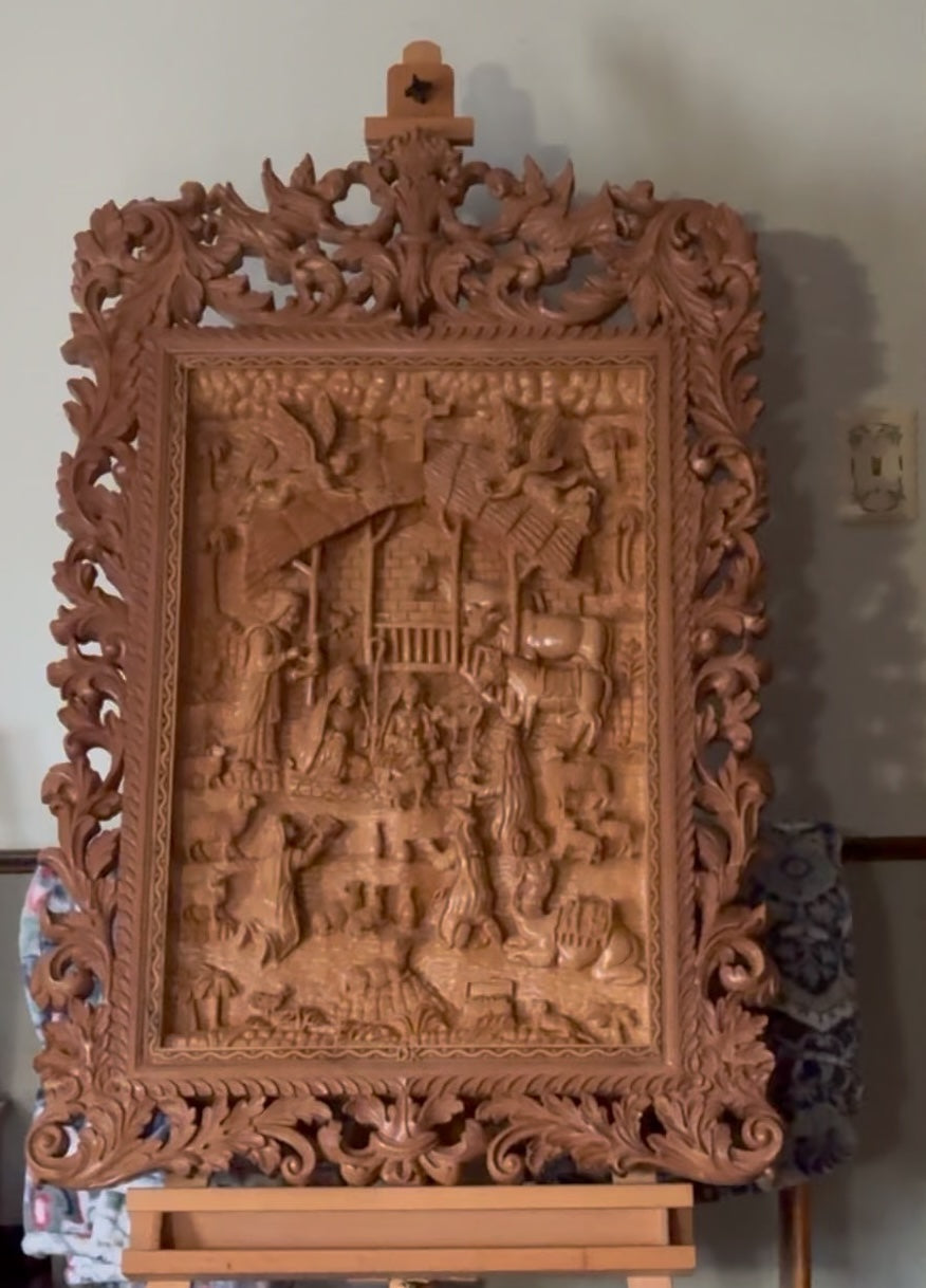 The Nativity — detail of the relief carving