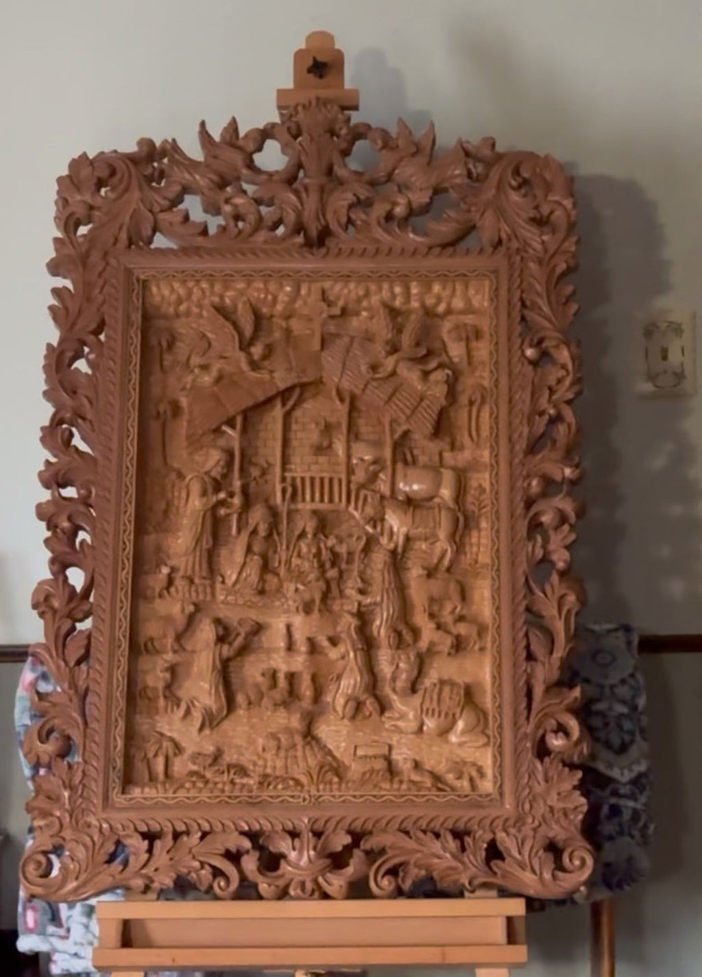 The Nativity — deep-relief carving in Indian white wood by D. K. Sharma