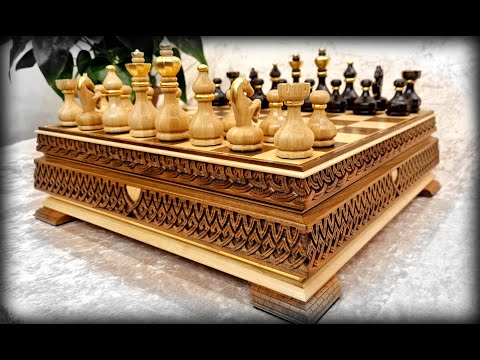 Edgar carving the Chess Set
